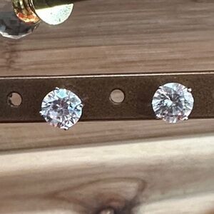 Crystal and 925 Silver Large stud earrings. Look 1 1/2 Ct. size.